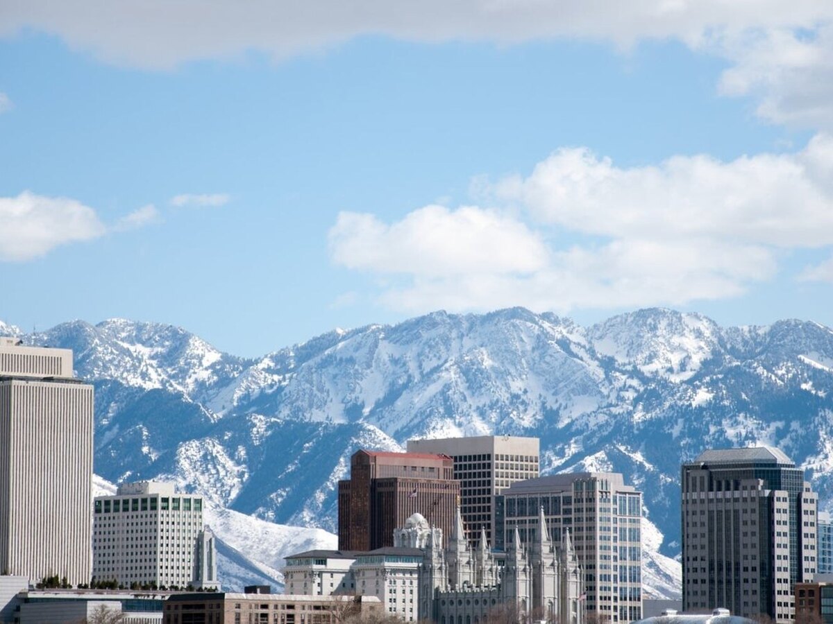 The Salt Lake City skyline below the snow-covered Wasatch Range