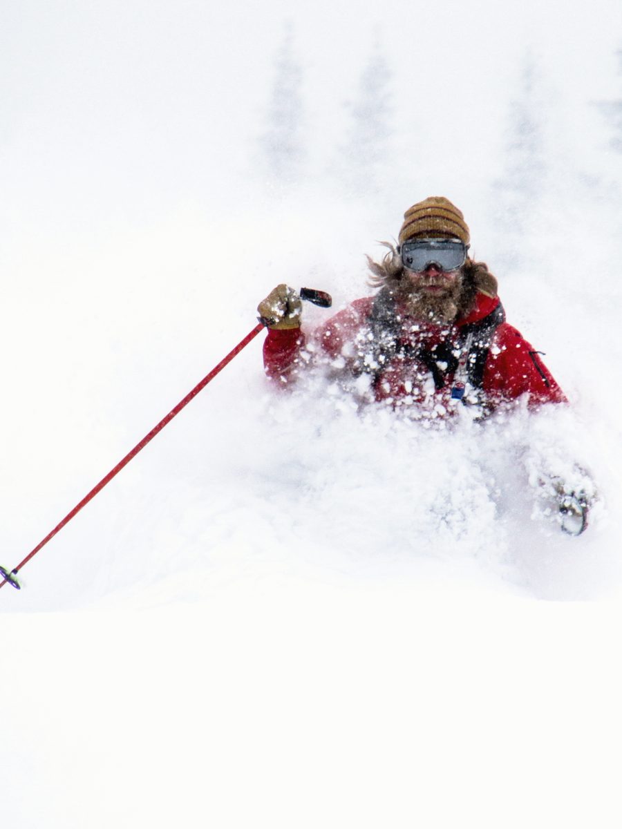 Bass skiing deep powder in the backcountry