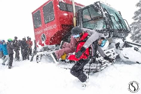 Bass and Madie at a Steamboat Powdercats snowcat in heavy snow